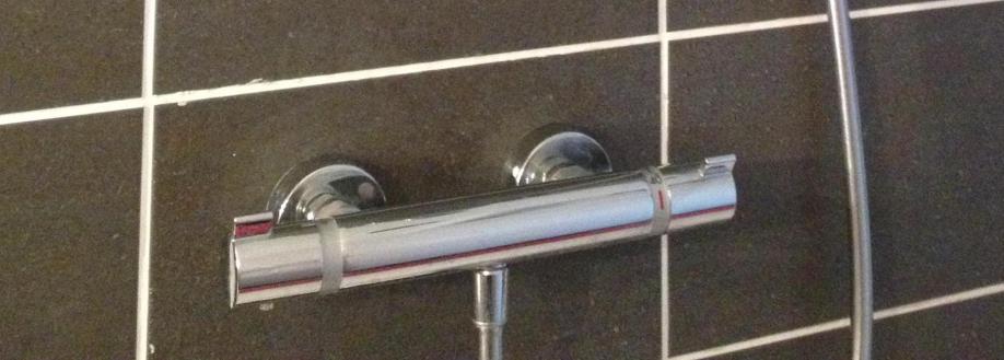 Main header - "Tom's total plumbing & heating services"