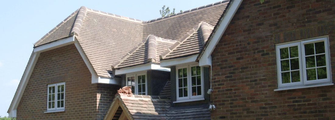 Main header - "P J M Roofing"