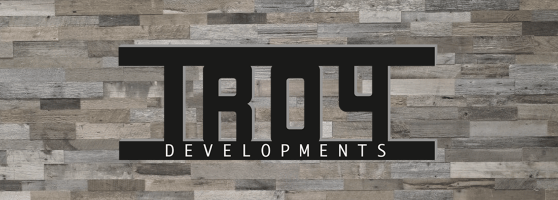 Main header - "Troy Developments"