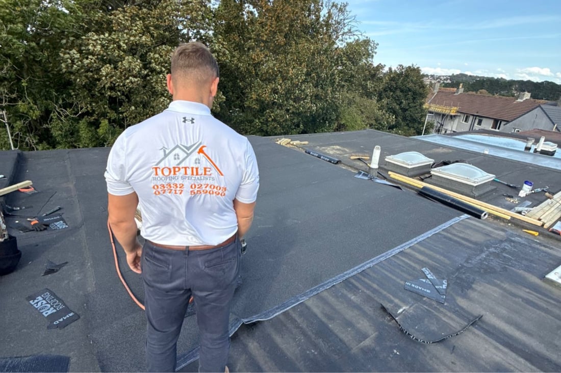 Main header - "TOP TILE ROOFING SPECIALISTS LTD"