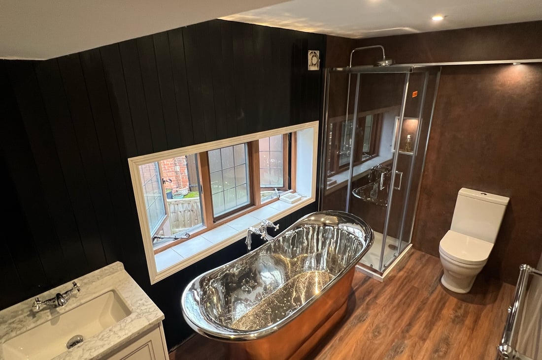 Main header - "L Palmer Bathrooms Kitchens & Plumbing"