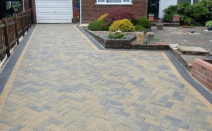 Main header - "STONE DRIVES & PATIOS LTD"