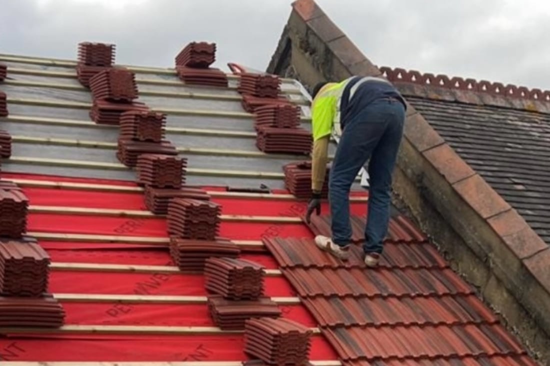 Main header - "TM Roofing and Building Services"