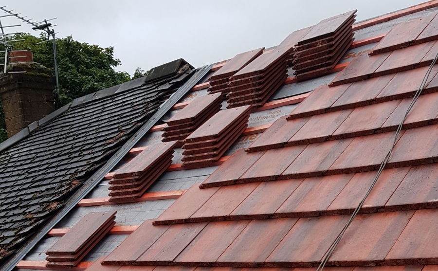 Main header - "Roof to Roof NW Ltd"