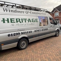 Main header - "Heritage Windows & Construction"