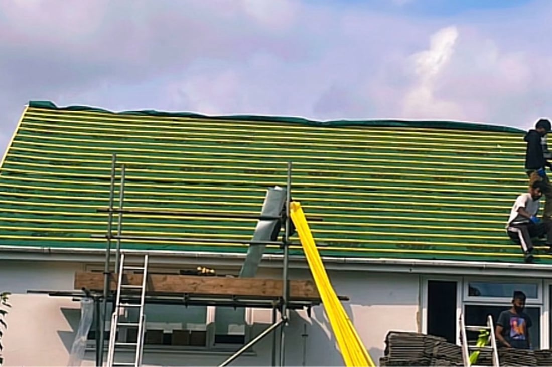 Main header - "Heritage Roofing"