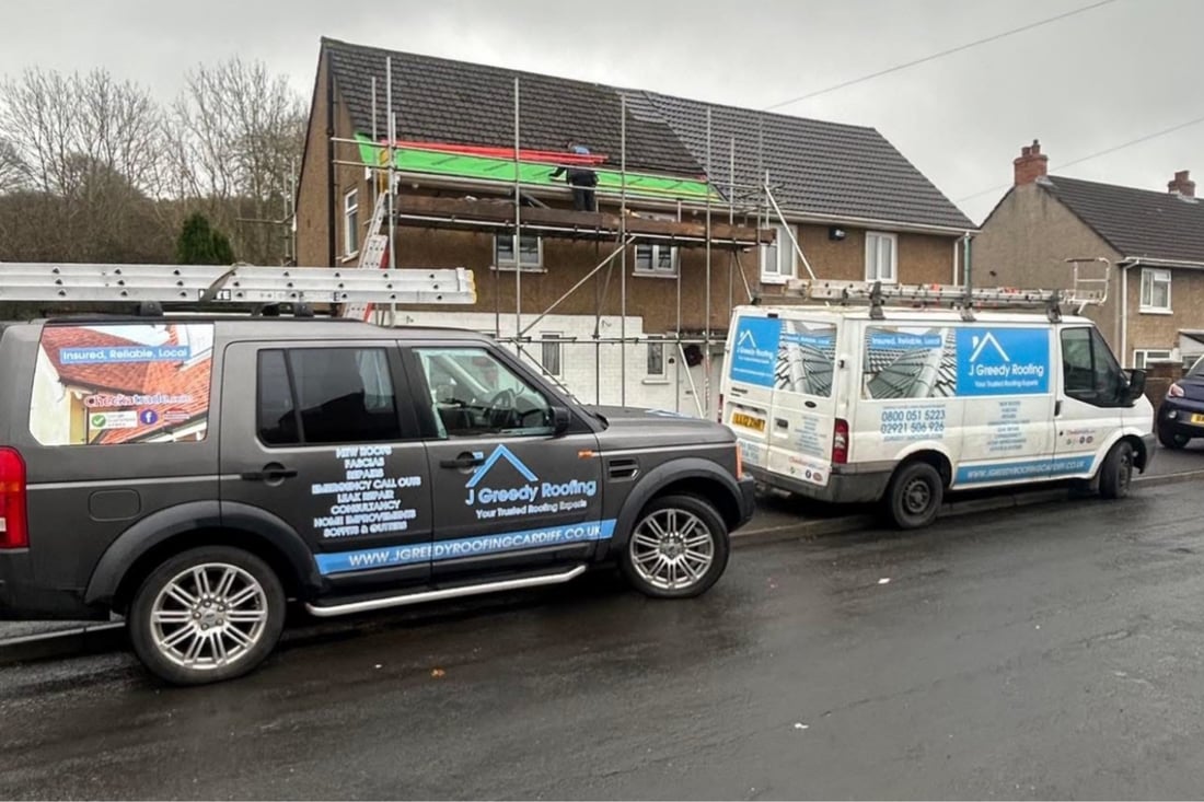 Main header - "J Greedy Roofing"