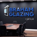 Company/TP logo - "BRAHAM GLAZING LTD"