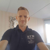 Company/TP logo - "STM Roofing & Paving"