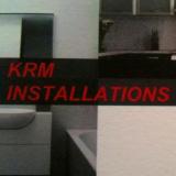 Company/TP logo - "KRM Installations"
