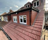 Company/TP logo - "Up & Above Roofing"