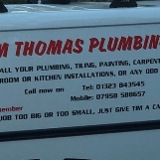 Company/TP logo - "Tim Thomas Plumbing & Tiling"