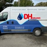 Company/TP logo - "DH DRAINS LTD"