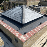 Company/TP logo - "The Roofing Company"