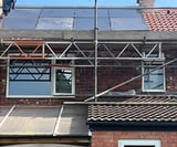 Company/TP logo - "TT Roofing & Building"