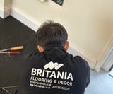 Company/TP logo - "Britania Flooring & Decor"