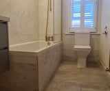 Company/TP logo - "Weathertite Constructions"