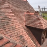 Company/TP logo - "Thomas Adams roofing"