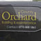Company/TP logo - "ORCHARD COUNTY BUILDERS"