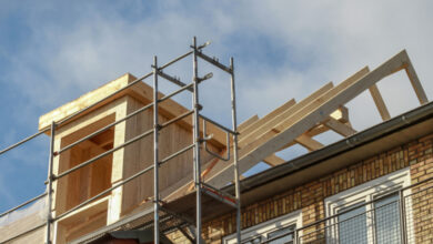 Picture of a home with scaffolding on the roof