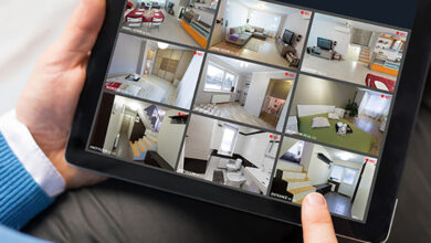 Man using smart home app on tablet