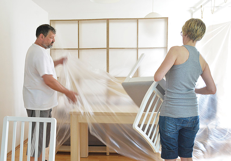 Covering furniture with a sheet
