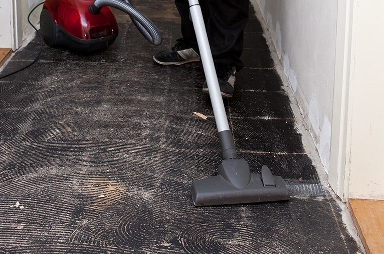 Corridor being vacuumed to prepare for further home improvement work