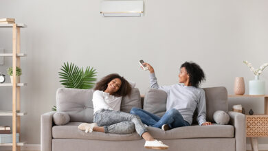 Family sitting on sofa