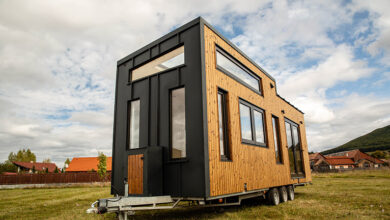 Mobile tiny home near houses