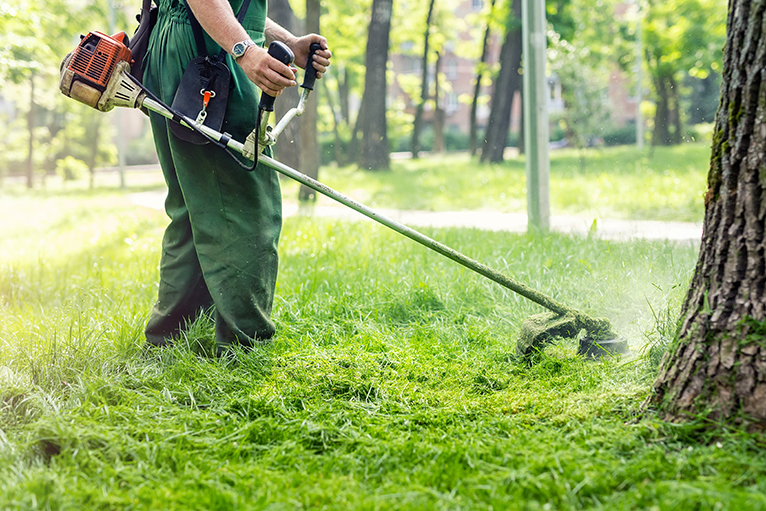 Gardener using gardening tools