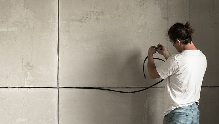 Picture of a wall getting rewired