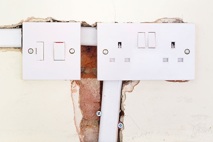 Image of a British domestic socket and switch