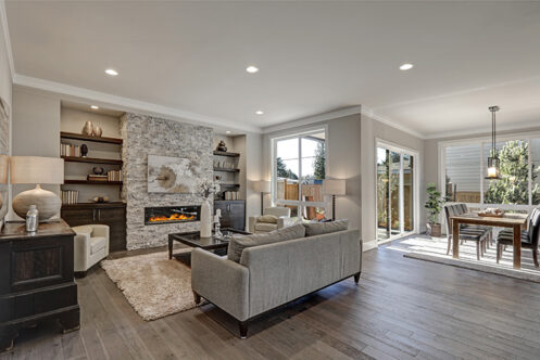 Picture of a living room with grey furniture and floors