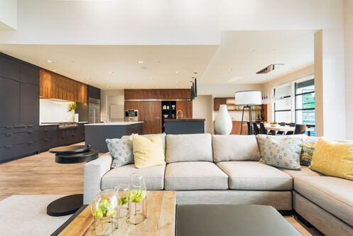Picture of an open plan living room with sofa and coffee table