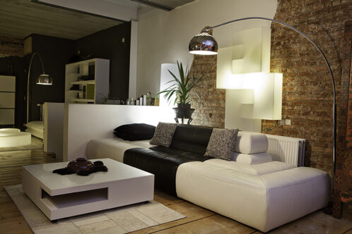 Picture of a living room with large overhanging lamp
