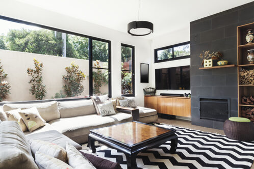 Picture of a dining room with black and white furniture 