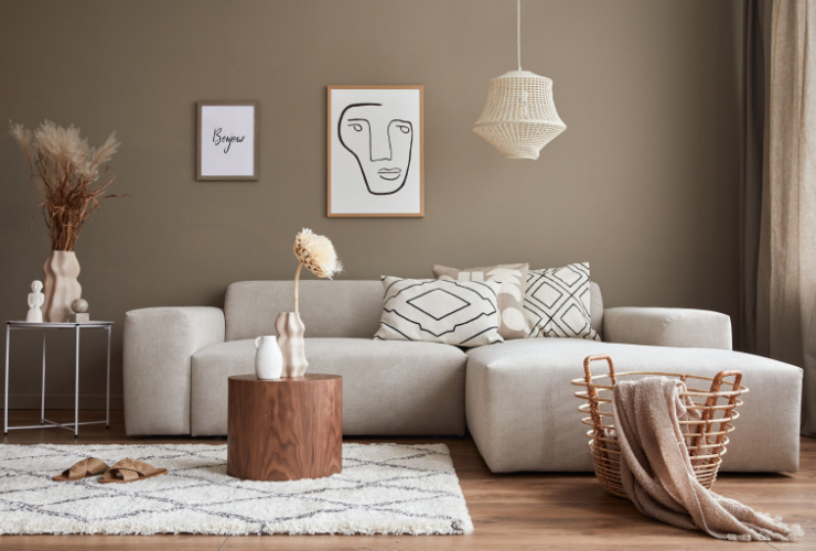 Picture of a living room with neutral, beige colours and wall art