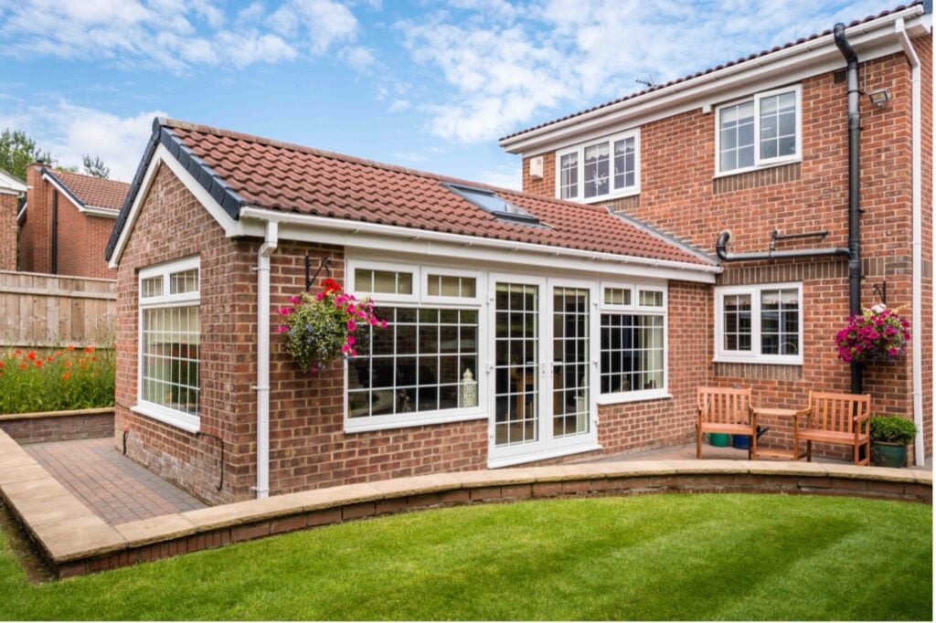 Picture of a brickwork side extension with large windows and skylight