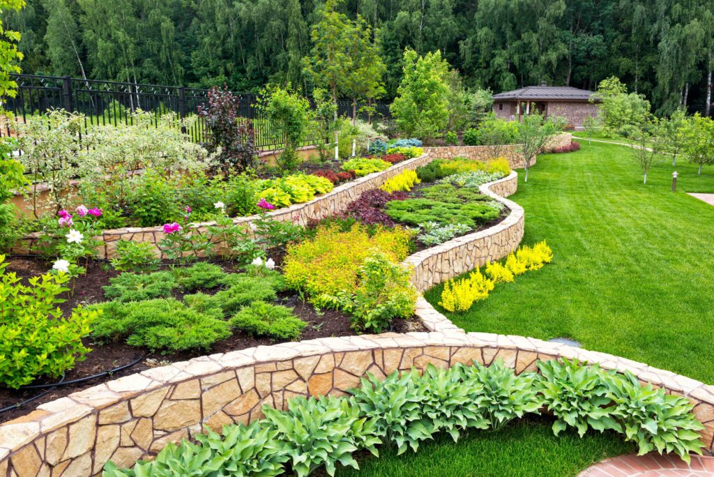Picture of a garden with garden landscaped raised flower beds planted with flowers