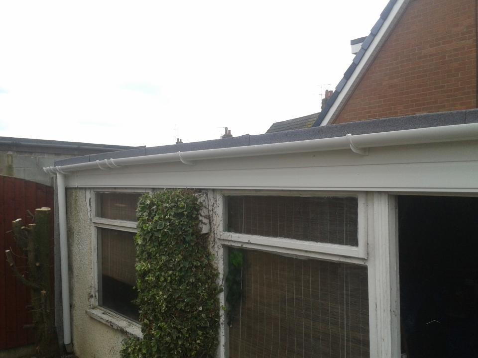 new flat roof with gutter/fascia