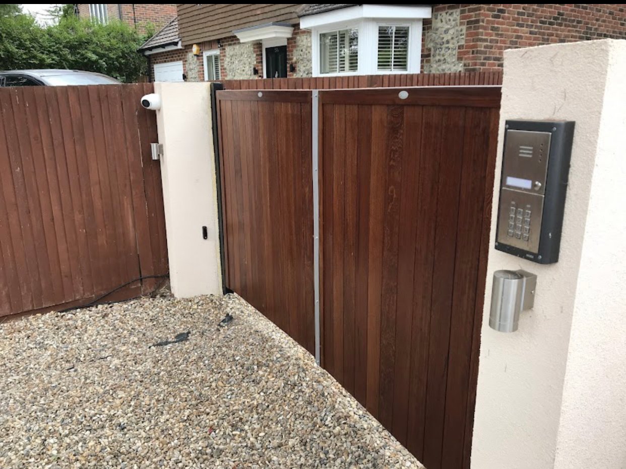 Electric gate and intercoms with lights and camera install.
